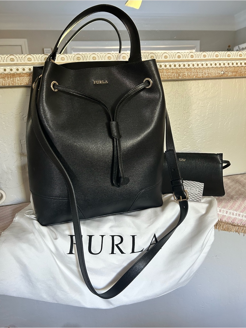 MSRP $358 Like new Furla Stacy Drawstring Bucket Bag in black